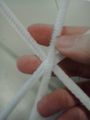 Add a third pipe cleaner across the fold to form a crude hexagonal arrangement. For a 5-way connector, offset the lengths so one is shorter than the others.